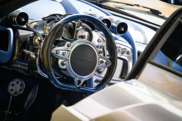 Intricate wheel in an sleek blue car