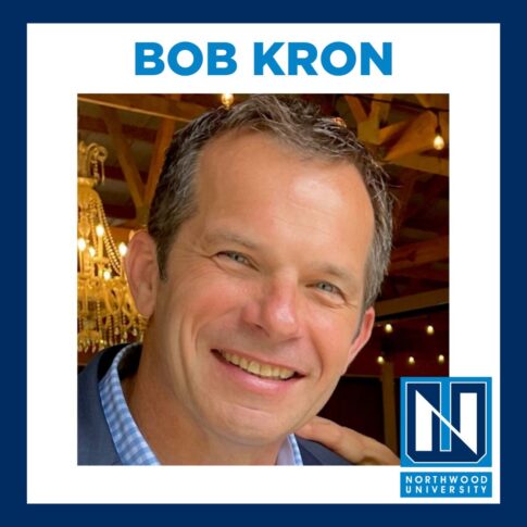 Portrait of a smiling man in a suit with the Northwood University logo in the corner. Text above reads "Bob Kron.