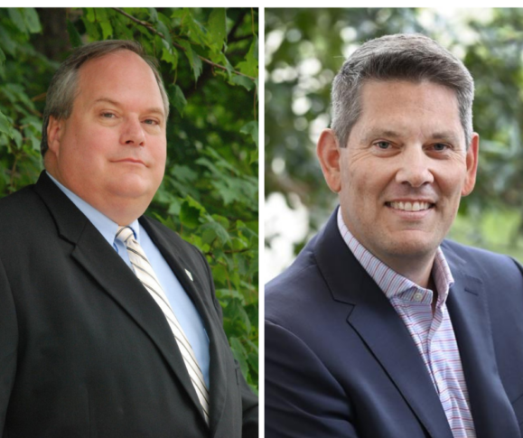 Two men in suits stand sharp and poised; the one on the left is framed by lush foliage, while the other poses outdoors against a backdrop of blurred greenery. Their presence naturally commands attention, much like keywords driving SEO in an Auto Draft process.