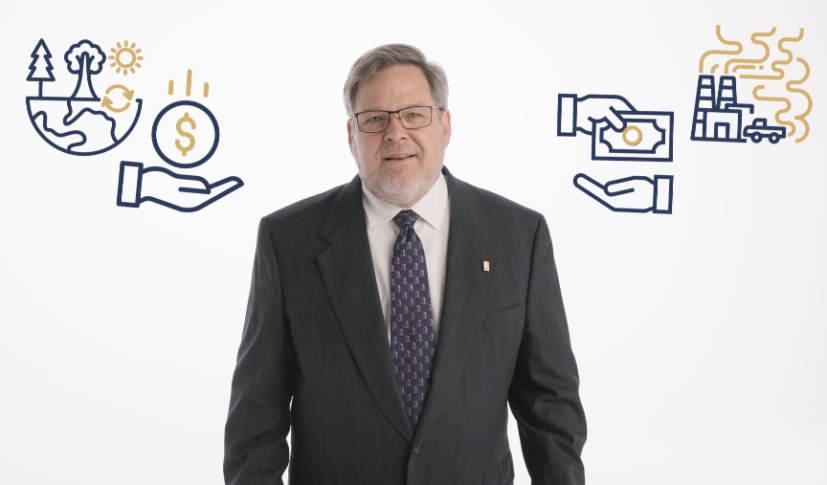 A man in a suit stands between two illustrated graphics: one showing sustainability symbols and a coin, the other showing a hand giving money to factories emitting pollution.