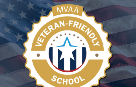 Northwood University badge labeled "MVAA Veteran-Friendly School, Gold '25-'26" over an American flag background.