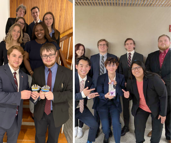 Two groups of young adults in formal attire pose indoors; one group stands on stairs holding paper crowns, the other sits and kneels, holding a small trophy or award.